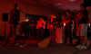 Students take in a concert held in the student lounge. - Photo by Kristen Nicole Sayres