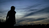 Freshman Kristmar Rawlins takes in a Union sunset. - Photo by Stephanny Rodriguez