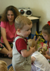 Kim Graves works with students who come to the Community Music Center with the Kindermusik program. - Photo by Heather Phillips