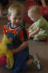 Students participate in a game in the Kindermusik program at the Community Music Center. - Photo by Heather Phillips