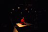 Jared New' J.B. is surrounded by the rest of the cast near the end of the theatre's production of <em>J.B.</em> - Photo by Morris Abernathy
