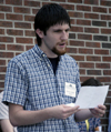 Jerome Azbell presents a creative writing piece during the Scholarship Symposium. - Photo by Stephanny Rodriguez