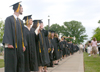 A group of social work majors filed onto the Great Lawn for spring graduation. - Photo by Stephanie Schroeder