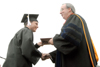 Andy Kelly of Orlando, Fla., receives a bachelor of arts degree in Christian studies. - Photo by Tim Weisemann