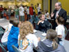 President Dockery fellowships with Brad Spencer and a group of freshmen at the Ice Cream Social during New Student Orientation. - Photo by Brad Moore