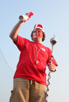 Josh Clarke, sophomore class president, sounds the horn during a pep rally before a Union soccer match. - Photo by Kyle Kurlick
