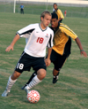 Christopher Prentice attempts to keep possession of the ball during a match at Union. - Photo by Kyle Kurlick
