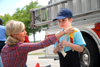 Jada Butler fellowships with a youngster during a Make-A-Wish event. - Photo by Kristen Nicole Sayres