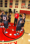 Head coach Mark Campbell gives instructions to his players during practice. - Photo by Brad Moore