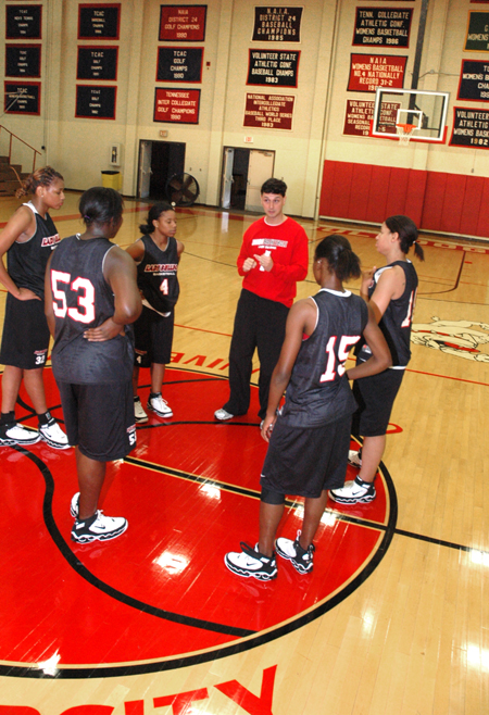 Head coach Mark Campbell gives instructions to his players during practice.