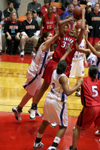 Natanya Smith takes a shot through lots of contact from Lubbock Christian University defenders.  Union won the game for their second straight NAIA National Title. - Photo by Steven Aldridge
