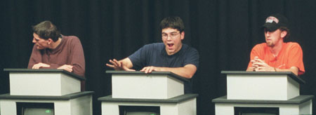 Assignment: <i>Head to Head</i> - Sophomores Adam Houston, digital media studies major, Jonathan Yorkowitz, broadcasting major, and Broc Barnes, broadcasting major, all compete as contestants during a trial taping of <i>Head to Head</i>.