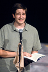 Tyler Whetstone reads a passage during Cafe Bongo. - Photo by Kristen Nicole Sayres