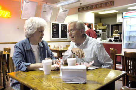 Wayne Johnson and his lovely wife, Carol, munch on some fries and sip some soda as they enjoy some time together after a hard day of work. They shared stories of the day’s events and remnisced about their earlier life experiences.
