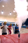 A group of children react to a chemistry presentation by Dr. Charles Baldwin at the Lincoln Elementary School for <em>Mathematics and Science in Jackson</em>. - Photo by Brad Moore