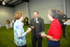Tommy Sadler, associate athletic director, talks to former Union vice president Maggie Nell Brewer at the Fesmire Field House dedication. - Photo by Morris Abernathy