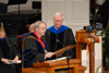 President Dockery presents Carl E. Zylstra, president of Dordt College, with a plaque of appreciation prior to his commencement address at summer graduation. - Photo by Morris Abernathy