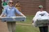 Dean Kimberly Thornberry helps the brother of Dustin Evans as his family moves Dustin's boxes into his dorm.
 - Photo by Kyle Kurlick