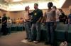 Joel Polk, Austin Clark and Jalissa Johnson worship at family chapel service during New Student Orientation. - Photo by Kyle Kurlick