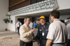 President David S. Dockery and Senior Vice President for Business Services Gary Carter speak with John Paul Cole from the TBC Disaster Relief team about tornado damage relief efforts that will begin Monday morning.  - Photo by Jim Veneman