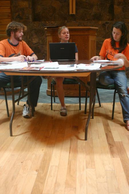 Junior Kyle Kurlick, photo editor, Senior Crystal Kinser, editor-in-chief and Senior Jenni Betts, managing editor, lead the newspaper staff in a brainstorming session for the new year.
