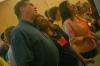During the student led worship time of the family chapel service on the first night of New Student Orientation, family members and students shared a few last moments together before saying good-bye. - Photo by Stephanie Schroeder