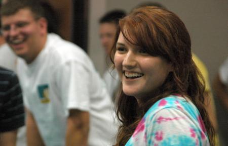 Junior Renee Roberson enjoys hearing Bryan Emerson perform at open mic night. 
