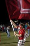 Jonathan Lambach waves the U flag after the men's soccer team wins 2-1 in overtime against Lindsey Wilson College. - Photo by Kyle Kurlick