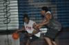 Freshman Kennedy Okello drives against senior forward Dewayne Lee during a Bulldog practice session. - Photo by Holly Gushee