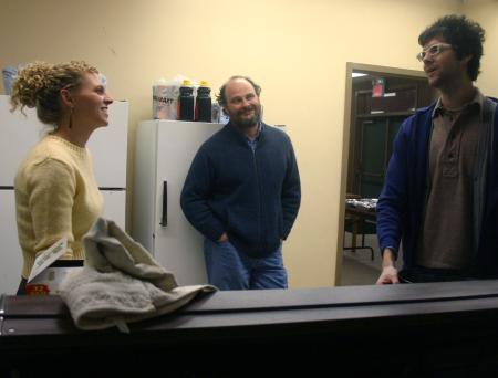 Professors Lori Nolen, Lee Benson, and Jonathan Gillette enjoy talking to each other before dinner is served friday night at the art retreat.