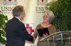 Jimmy H. Davis was presented with Distinguished Faculty/Staff Award by Judy Fletcher at the Alumni Awards Dinner during Homecoming. - Photo by Morris Abernathy