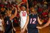 Senior forward Natanya Smith takes a shot over the defenders from St. Gregory's University (Okla.). - Photo by Morris Abernathy