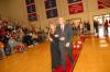 Junior Carolyn Negley, learning foundations major from Brentwood, Tenn., who is the daughter of John and Jean Negley, is escorted onto the court by her father before the naming of the queen during Homecoming. - Photo by Morris Abernathy