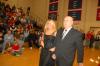 Senior Beth McDowell, nursing major from Cape Girardeau, Mo., who is the daughter of Gary and Donna McDowell, is escorted onto the court by her father before the naming of the queen during Homecoming. - Photo by Morris Abernathy