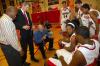 Head Coach Ralph Turner, now in his 13th season with the Bulldogs, addresses the players during a timeout. - Photo by Morris Abernathy