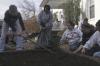 Students from Union spread throughout the city of Jackson on Nov. 8 as a part of the annual Day of Remembrance. This group worked at The Care Center weeding gardens and walkways. - Photo by Kyle Kurlick