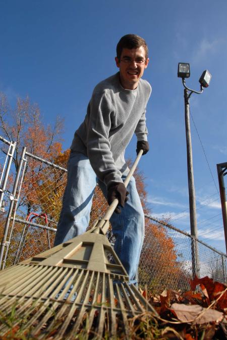 Will Trautman helps out at the YMCA in east Jackson during Day of Remembrance.