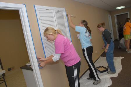 Beth McDowell, Elizabeth Hyndman and Kasey Nunn help out at Birth Choice in Jackson during Day of Remembrance.