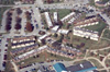 Watters and Hurt Residence Complexes from the air at 3 p.m. on the tornado damage clean-up day. - Photo by Wayne Holmes