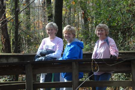 Union staffers Suzanne Nadaskay, Cheryl Mercker and Carol Courtner pick up trash at Cypress Grove during Day of Remembrance.