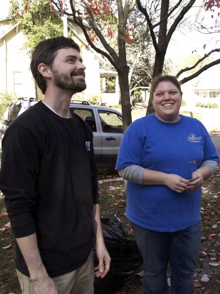 Stephanie Perry and Justin Philips poke fun at their SAC teammates painting skills the Young Life house as a part of Remembrance Day.  