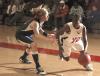 Lady Bulldog LaTorya Fuller drives past a Vanguard University defender during the Rotary Classic tournament. - Photo by Matthew Diggs
