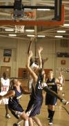 Josephine Owino goes up for a shot during a game against Vangaurd University at the Rotary Classic tournament.  - Photo by Matthew Diggs