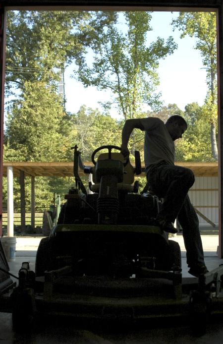 Before a riding mower can be driven out to do it's job, the oil must be checked, gears must be greased and the tank filled. Matt Brasfield goes through this checklist every day before mowing.  