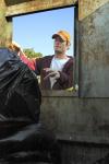 Every morning, Mike Growe and the rest of the grounds crew venture out to collect trash from the cans and off the ground.  - Photo by Matthew Diggs