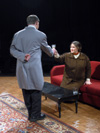 The family butler, Crestwell, played by Jeremy Parker serves Lindsey Garner as Mrs. Dora Moxton in <i>Relative Values</i>. - Photo by Jim Veneman