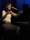 Christian recording artist Sara Groves shares some stories with the audience between songs at the 2006 Homecoming Coffee House. - Photo by Matthew Diggs