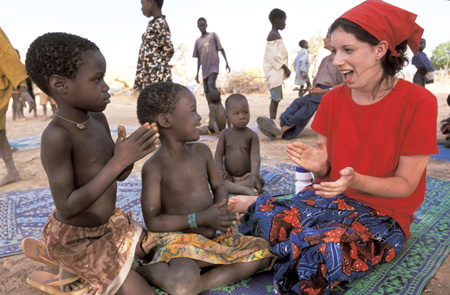 While sharing laughter and smiles with a couple of village children, sophomore Erin Joseph saw firsthand the hunger and poverty of the Marense. From the <i>Unionite</i> feature: <i>They Came To Join In</i>