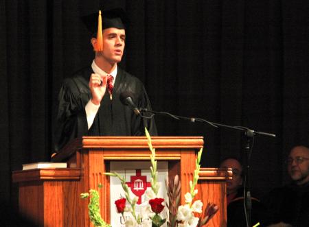 Senior Landon Preston, management major and SGA president, delivers a short speech during Fall  Convocation. 