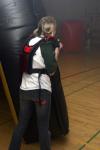 Kasey Cobb stands guard and prepared to shoot her laser gun to gain points in a laser tag game held in the small gym during Frost Fest put on by SAC. - Photo by Stephanie Schroeder